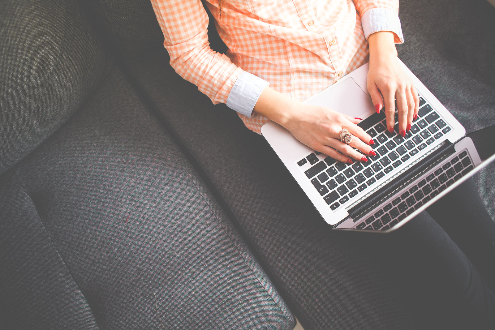 Image of lady typing on computer